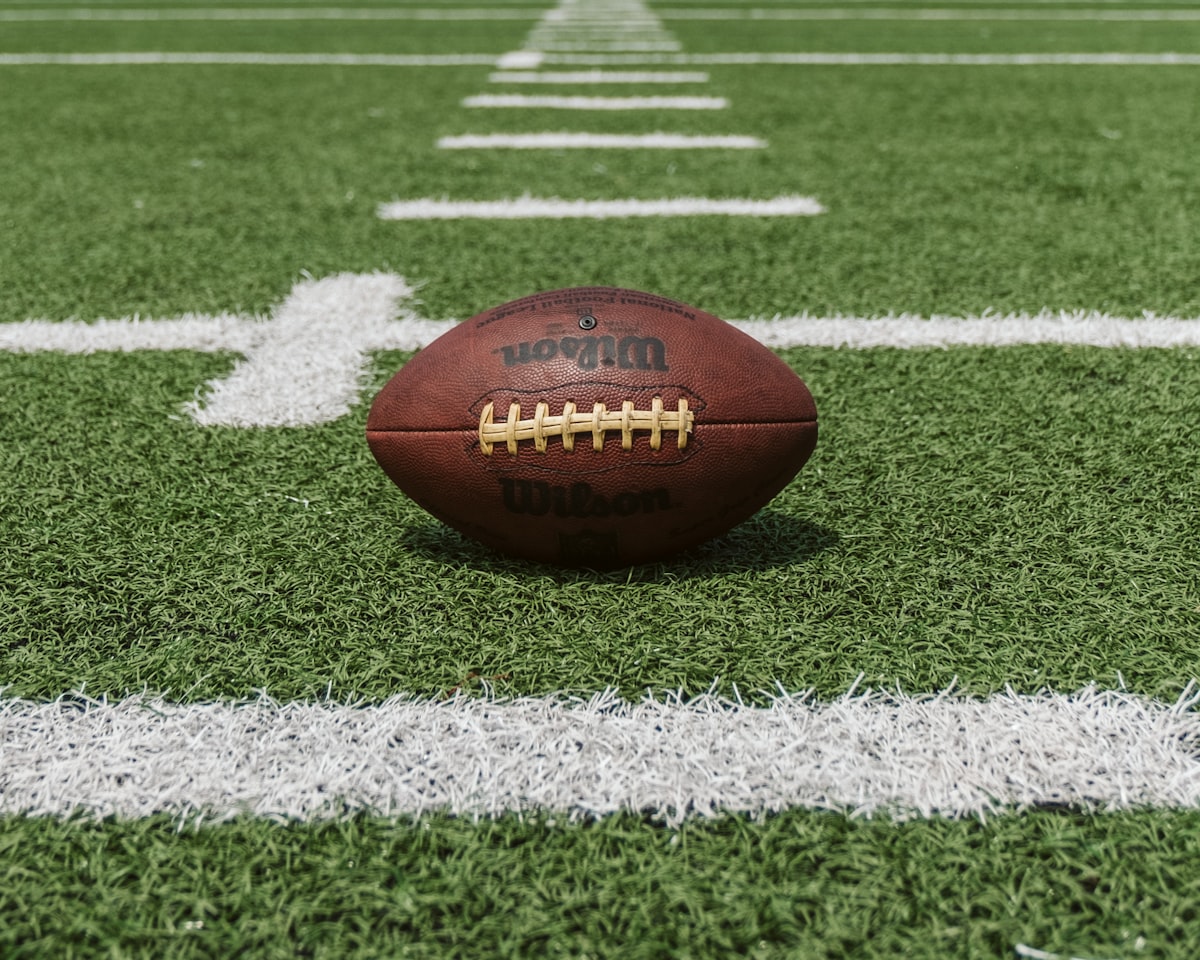 Gus Feeny playing football